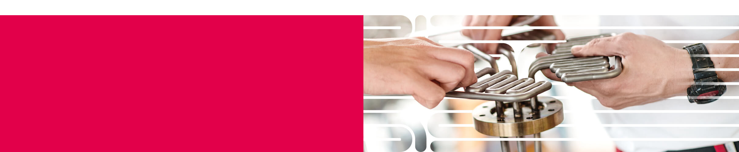 Close-up of two people holding an assembly